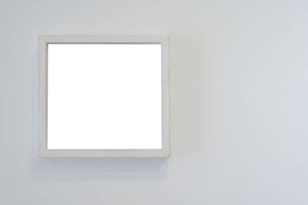 istock White square photo frame on the white wall background. 1710775704