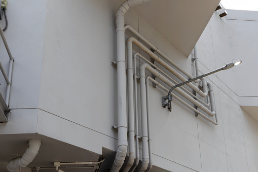 Outside the building, bile and sewerage system pipes are installed.