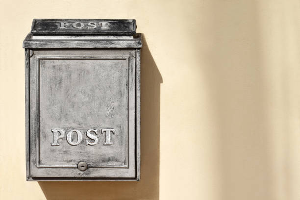 istock Old vintage mailbox or postbox on the concrete wall. 1710848143
