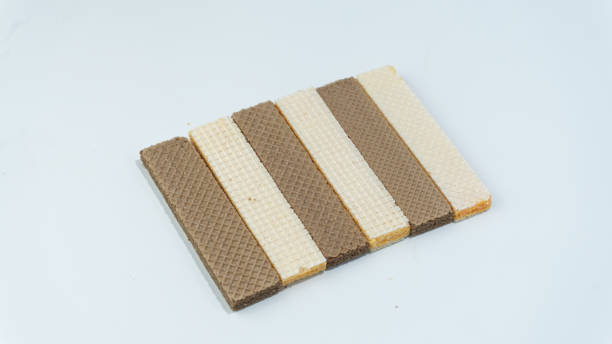 istock Cheese wafers and chocolate wafers isolated on white background 1710915330