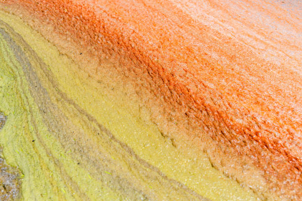 River polluted with brown foam of dirt.