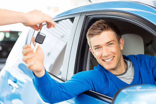 istock Happy Man Receiving Car Key 171100178