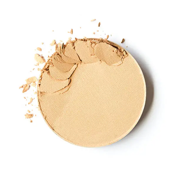 Face powder on white background.