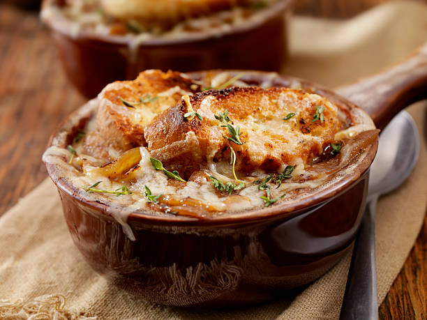 French Onion Soup French Onion Soup -Photographed on Hasselblad H1-22mb Camera cooked selective focus indoors studio shot stock pictures, royalty-free photos & images