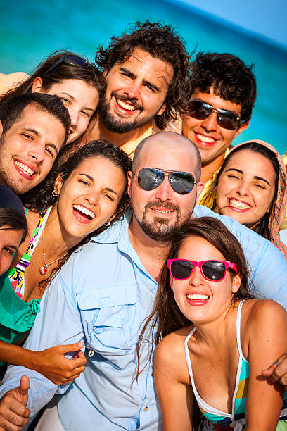 istock Group of young people with positive atitude on a beach 171101804