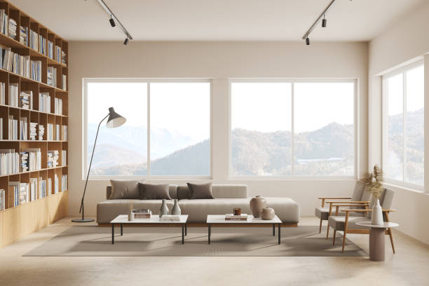 istock Cozy home living room interior with chill space and bookshelf, window 1711048854