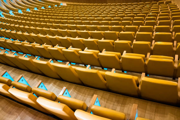 istock Row of empty seats in a theater. 1711049919