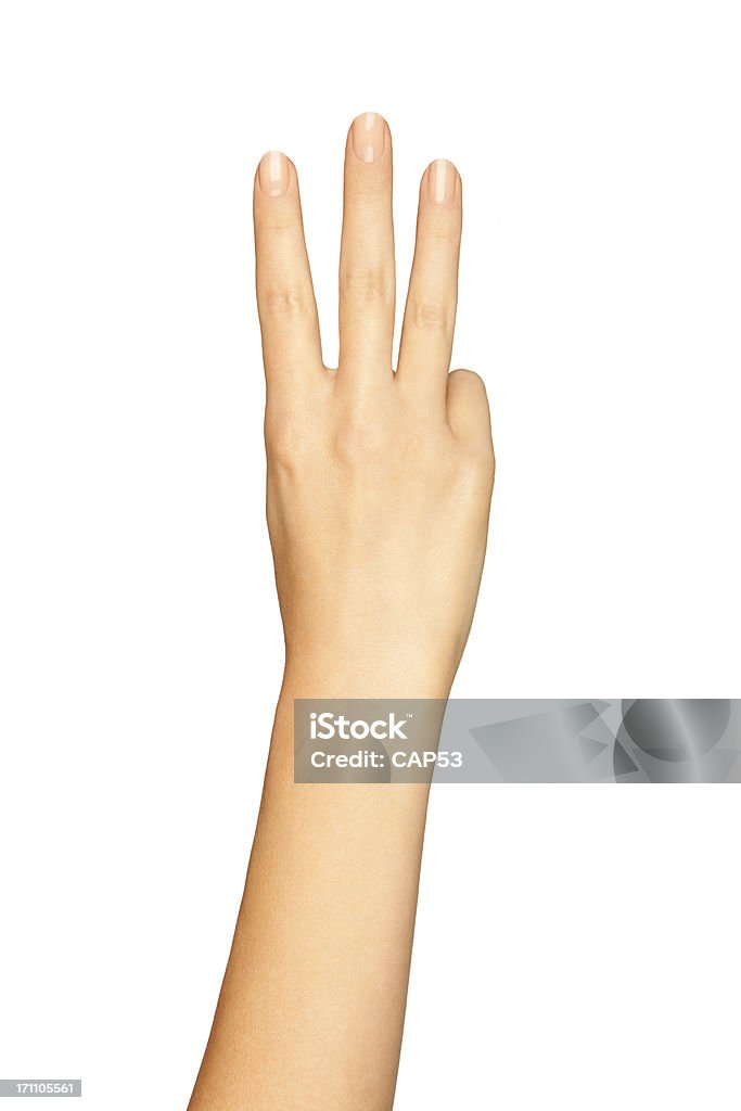 Rękę kobiety z trzema palcami na białym tle - Zbiór zdjęć royalty-free (Aspiracje)