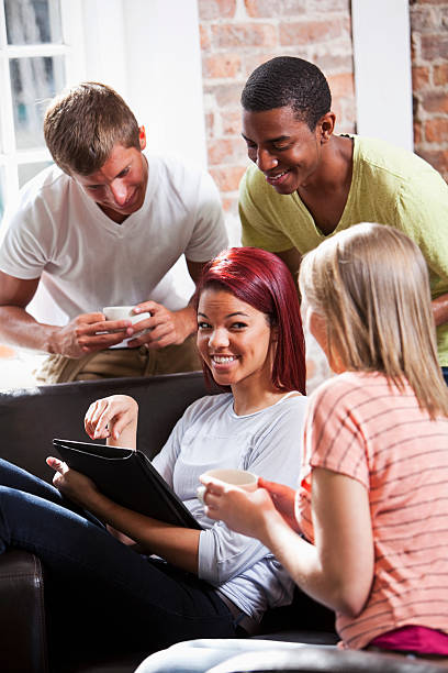 istock Multi-ethnic teenage friends with digital tablet 171106354