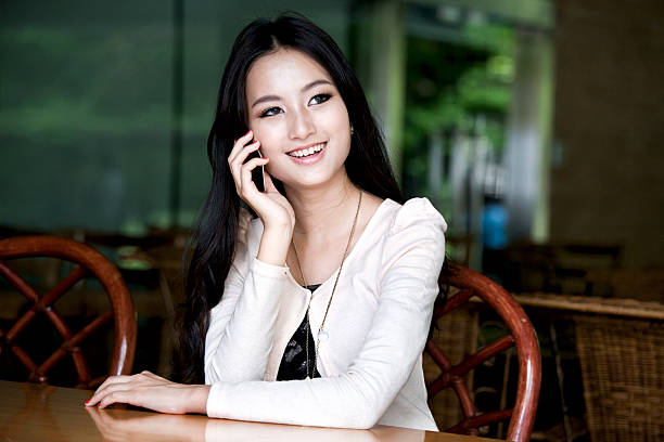 istock Woman with Cellphone in bar 171106436