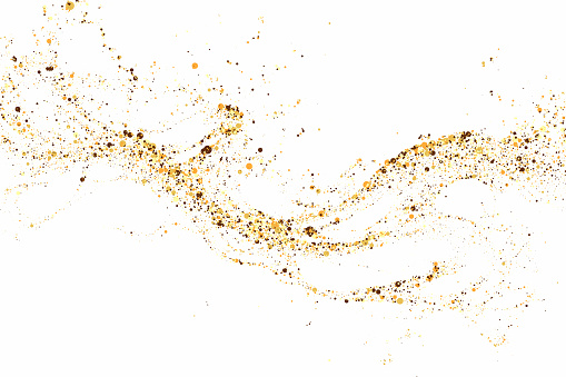 Gold sparkles scatter across the white. Magical abstract wave sparkles on party poster background
