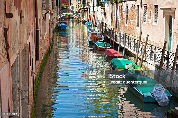 Small Canal With Bridge And Boats In Venice Italy Stock Photo - Download Image Now