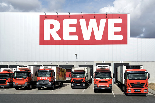 Raunheim, Germany - September 22, 2018: trucks at REWE distribution center