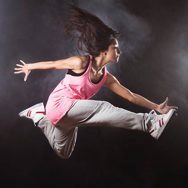 istock Hip-hop style female dancer jumping 171106932