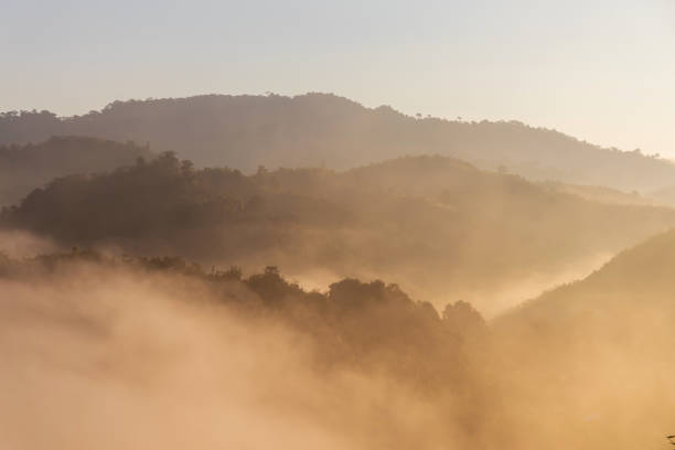 istock Fog with mountains in morning sunrise. Beautiful nature background. 1711069867