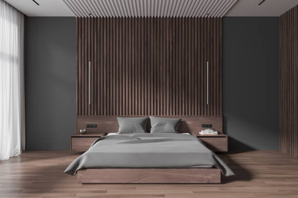 istock Grey home bedroom interior with bed, nightstand and tulle on window 1711072588