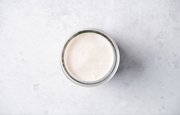 istock Pumpkin spices coffee creamer in a glass on a white background 1711074842