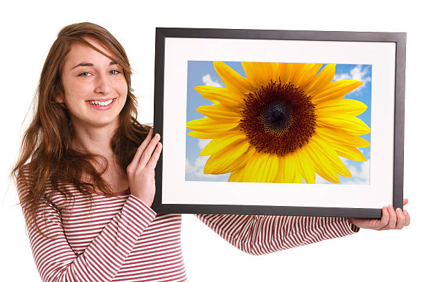 istock Girl Holding Picture Frame 171108737