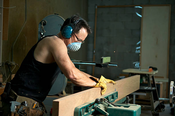 istock Man Building Custom Hardwood Furniture 171108742