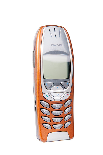 Amsterdam, The Netherlands - August 9, 2011: Nokia 6310i mobile phone isolated on white