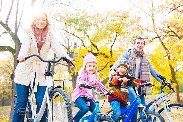 istock Happy family riding bicycles in nature. 171110074