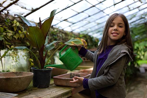 istock Little girl gardening 171110424
