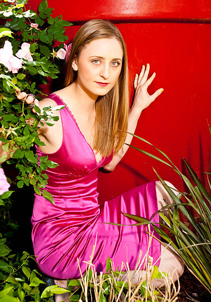 istock Fashonable Woman in the Flowers 171110695