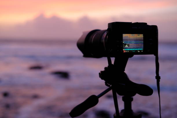 istock A camera on a tripod catching a sunset above the Atlantic ocean. 1711127937