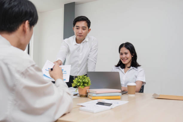 istock Group of creative asian business meeting and discussing strategy startup project analysis finance .Success asian business people work plan and brainstorm marketing idea with laptop in office.Teamwork 1711147225