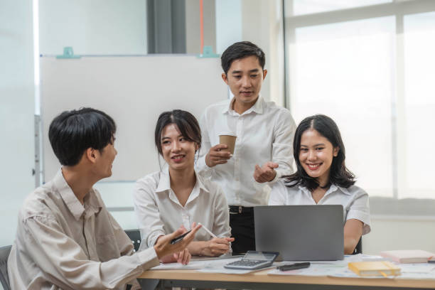istock Group of creative asian business meeting and discussing strategy startup project analysis finance .Success asian business people work plan and brainstorm marketing idea with laptop in office.Teamwork 1711148321