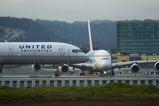San Francisco, California, United States - Nov 27, 2018: United Airlines Boeing 757 on the tarmac at San Francisco International Airport SFO prior to takeoff.