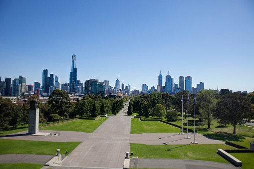 Melbourne CBD cityscape seen from park.