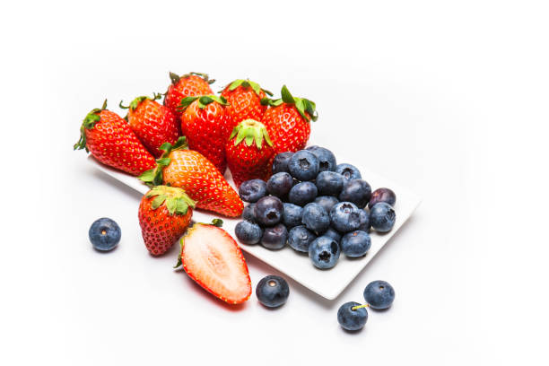 Red ripe strawberry background, close-up, front view, top view, strawberry plate with wood floor background,