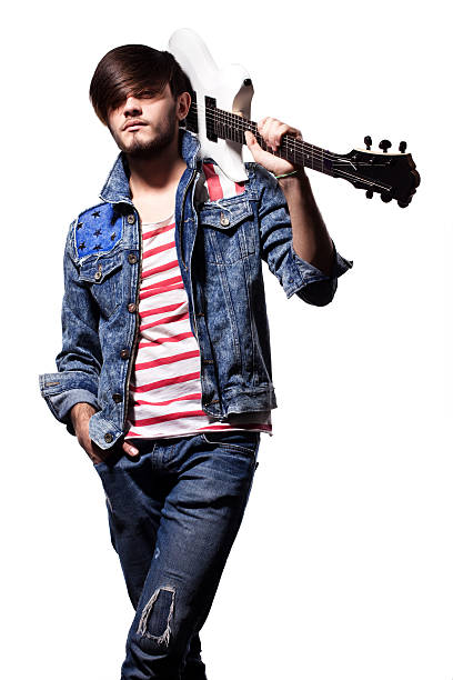 istock Portrait of a young man with guitar 171115681