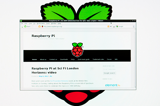 Lyme Regis, UK - May 8, 2012: Screenshot of the Raspberry Pi website in a Midori browser window, within the Linux based Debian operating system of a Raspberry Pi model B. Credit card sized computer based around the ARM11 mobile processor. It is primarily aimed at school children to learn computer programming. Price at launch was $35 plus local taxes.