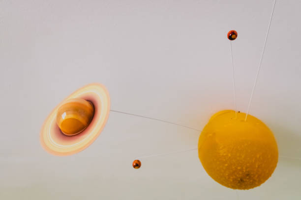 istock Toy planets high on the ceiling of a room. 1711163759