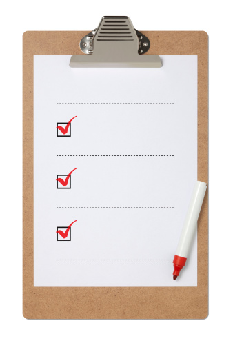 Checklist on clipboard with clipping path.