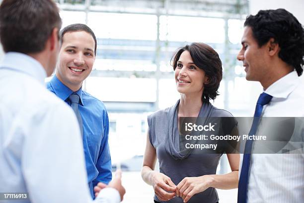 Enjoying A Quick Office Gettogether Stock Photo - Download Image Now - Business, Adult, Beautiful People