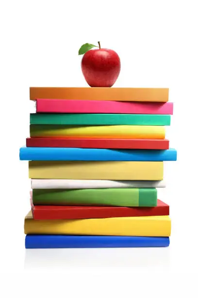 Photo of Apple on a Stack of Book