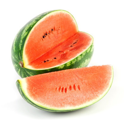 Sliced watermelon isolated on white background. Selective focus, shallow DOF.