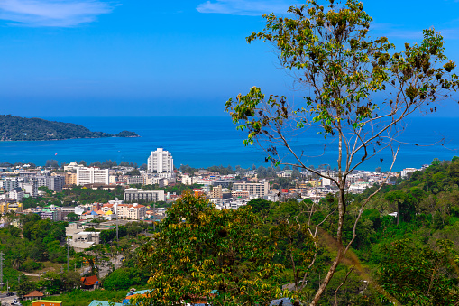 Panorama panoramic Colourful view of Patong Beach Phuket Thailand taken from patong mountains with lush rain forest