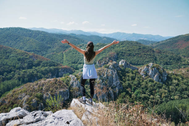 istock Woman standing in the mountain 1711235395