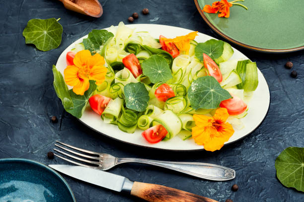 Tasty veggie salad with nasturtium stock photo