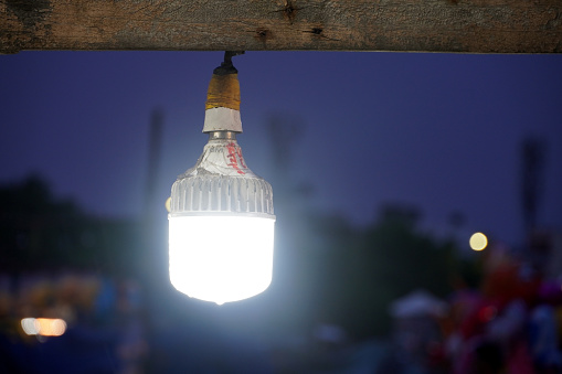 Closeup of bulbs hanging in the shops at Marina beach, Chennai, Tamilnadu.