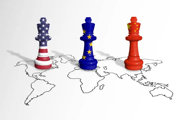 Photo of Chess made from USA, EU and China flags on a world map. China, Europe Union and United States of America trade competition