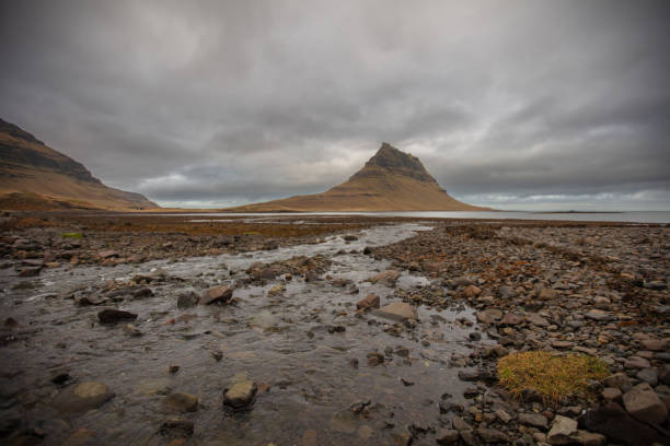 istock Tide at Kirkjufell mountain. 1711358136