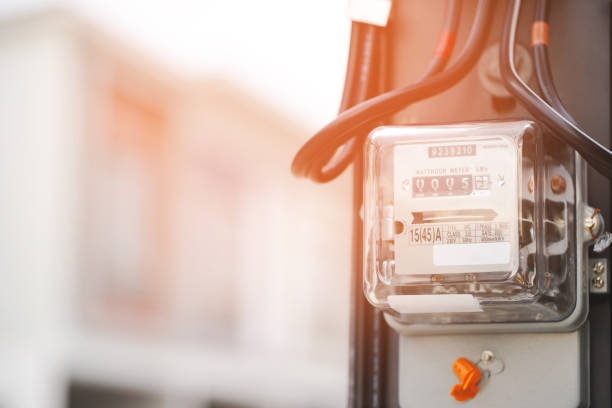 istock Electric power meter measuring power usage. Watt hour electric meter measurement tool at pole 1711359315