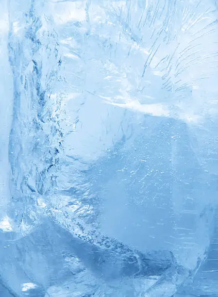 The beautiful textures and bubble formations inside a big chunk of ice. Great background for communicating coldness, like you often see on beverage ads etc.
