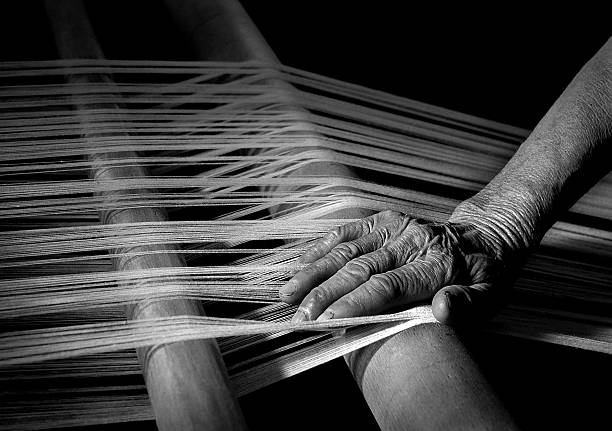 Handloom Looms on the old women's hands. loom photos stock pictures, royalty-free photos & images