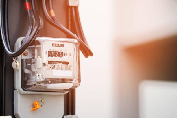 istock Electric power meter measuring power usage. Watt hour electric meter measurement tool at pole 1711359895